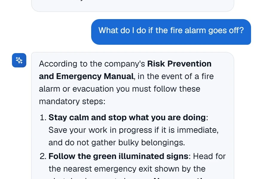 The AI tutor in the app: asked “What do I do if the fire alarm goes off?”, it answers with the steps to follow, based on the company's safety and emergency manual.